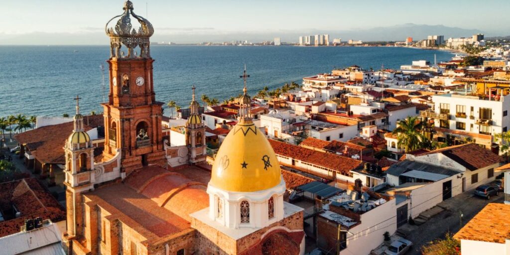 Aerial view of Puerto Vallarta beaches overlooking a church